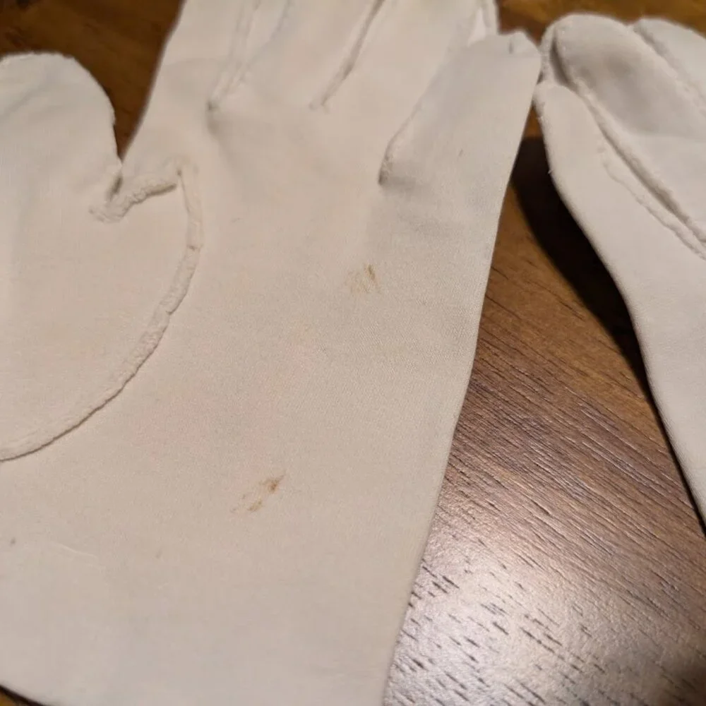 Vintage white wrist length cotton gloves embellished with delicate white buttons